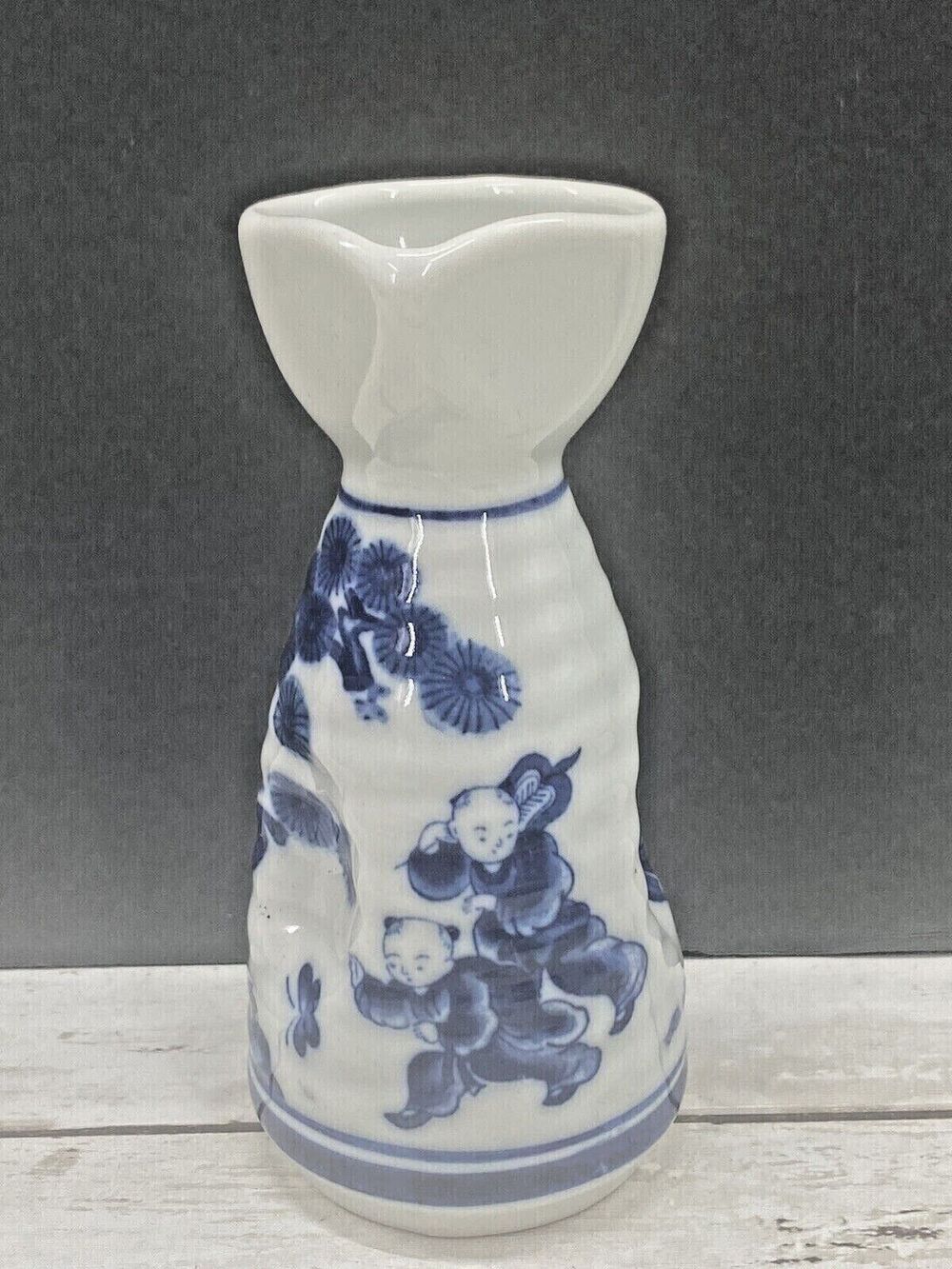 Small Antique Japanese Blue and White Porcelain Sakura Tree Sake Bottle